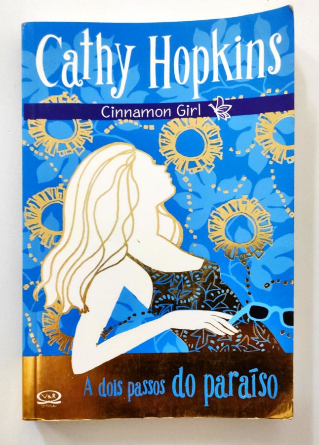 <a href="https://www.touchelivros.com.br/livro/cinnamon-girl-a-dois-passos-do-paraiso/">Cinnamon Girl – a Dois Passos do Paráiso - Cathy Hopkins</a>