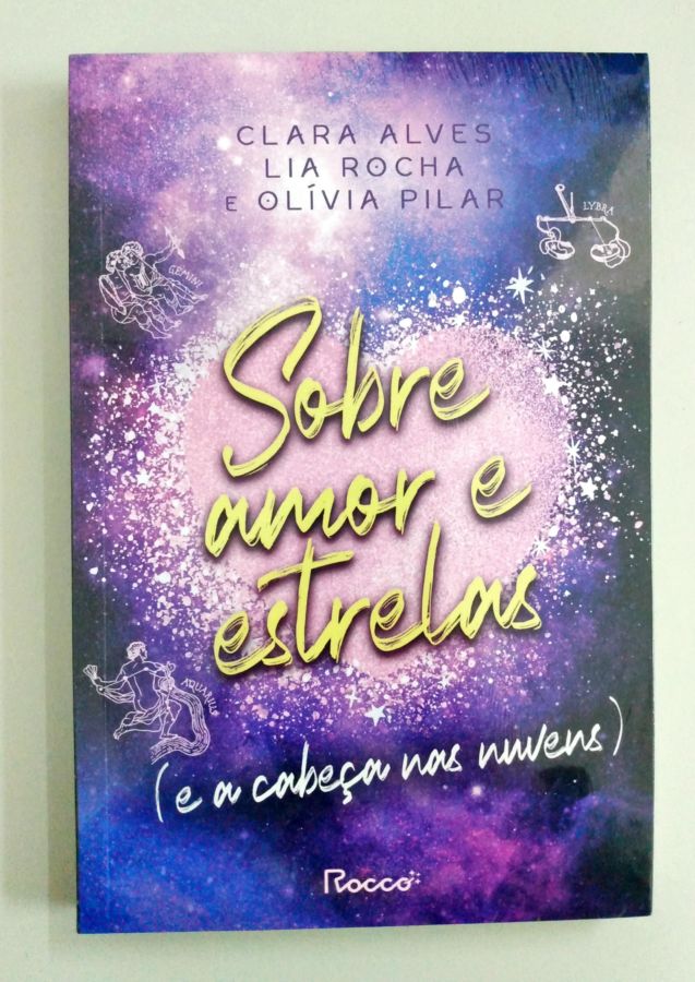 <a href="https://www.touchelivros.com.br/livro/sobre-amor-e-estrelas-e-a-cabeca-nas-nuvens/">Sobre Amor e Estrelas (e a Cabeça Nas Nuvens) - Clara Alves; Lia Rocha; Olívia Pilar</a>