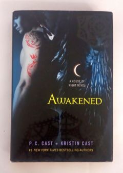 <a href="https://www.touchelivros.com.br/livro/awakened-house-of-night/">Awakened House of Night - P.C. Cast; Kristin Cast</a>