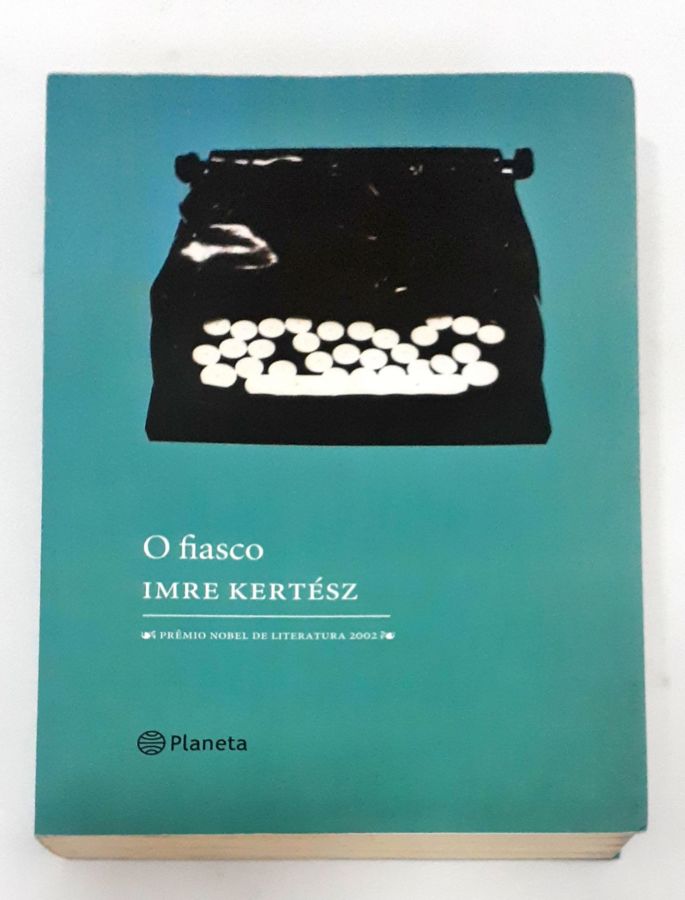 <a href="https://www.touchelivros.com.br/livro/o-fiasco/">O Fíasco - Imre Kertesz</a>