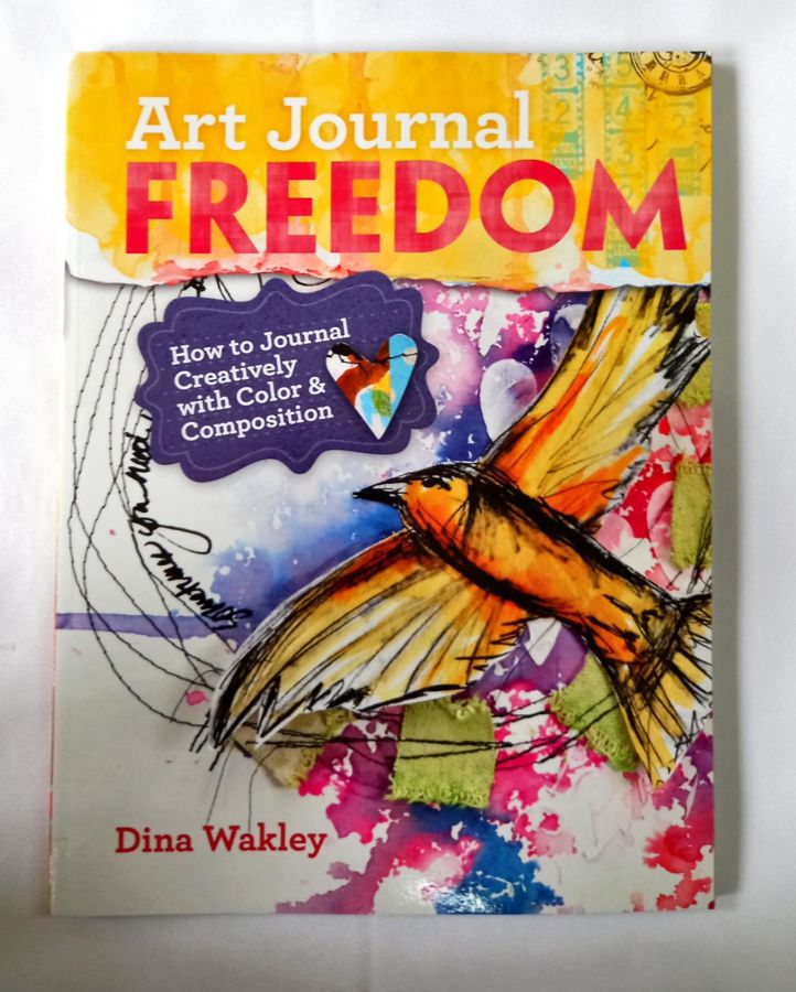 <a href="https://www.touchelivros.com.br/livro/art-journal-freedom/">Art Journal Freedom - Dina Wakley</a>