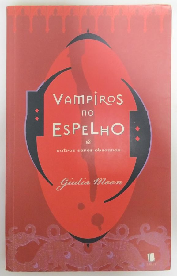 <a href="https://www.touchelivros.com.br/livro/vampiros-no-espelho/">Vampiros no Espelho - Giulia Moon</a>