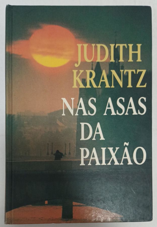 <a href="https://www.touchelivros.com.br/livro/nas-asas-da-paixao/">Nas Asas Da Paixão - Judith Krantz</a>