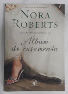 <a href="https://www.touchelivros.com.br/livro/album-de-casamento-quarteto-de-noivas-livro-1/">Album De Casamento (Quarteto de noivas – Livro 1) - Nora Roberts</a>