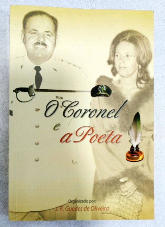 <a href="https://www.touchelivros.com.br/livro/o-coronel-e-a-poeta/">O Coronel E A Poeta - J. R. Guedes De Oliveira</a>