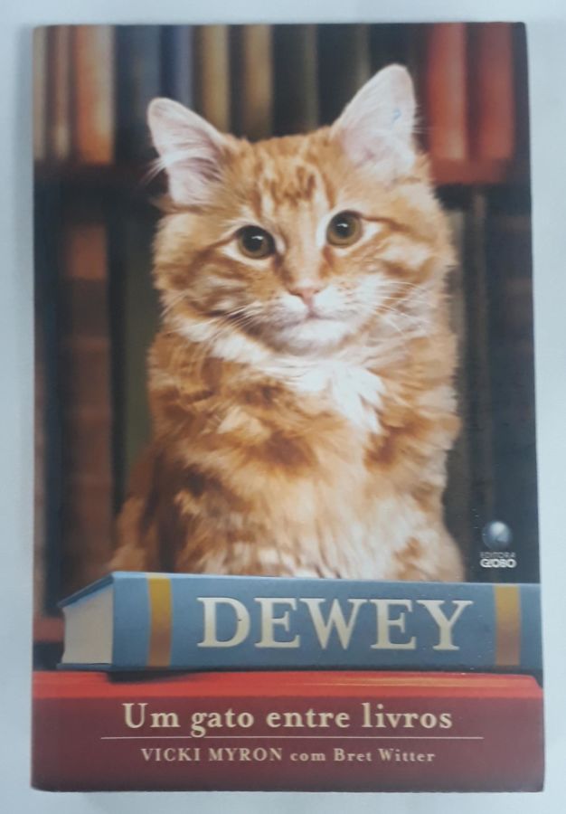 <a href="https://www.touchelivros.com.br/livro/dewey-um-gato-entre-livros/">Dewey Um Gato Entre Livros - Vicki Myron</a>