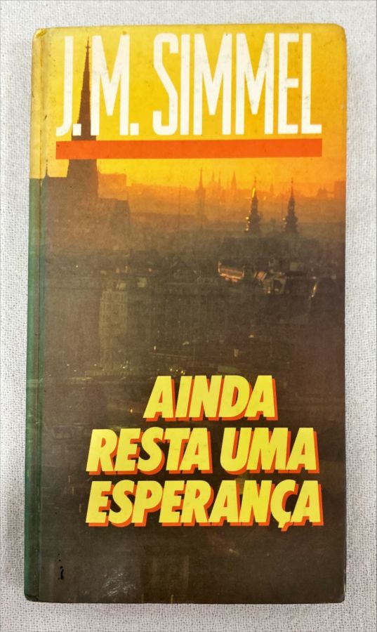 <a href="https://www.touchelivros.com.br/livro/ainda-resta-uma-esperanca/">Ainda Resta Uma Esperança - J. M. Simmel</a>